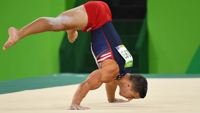 Jacob Dalton (USA) competes on the floor in the men's qualification during the Rio 2016 Summer Olympic Games at Rio Olympic Arena.