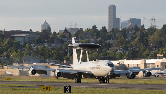 A classic NATO E-3 Sentry airborne early warning and control (AWACS) jet lands at Seattle's Boeing Field Airport.