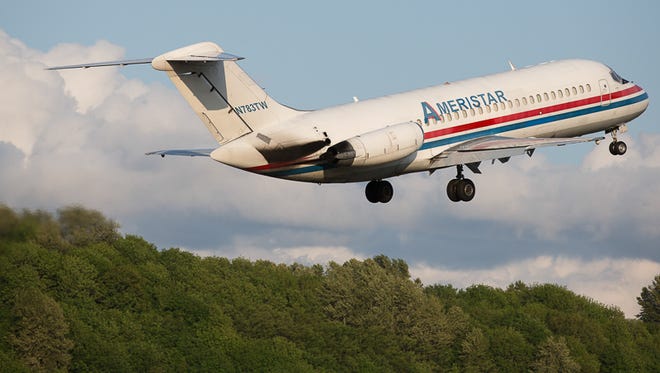 An Ameristar DC-9 takes off from Seattle's Boeing Field airport.