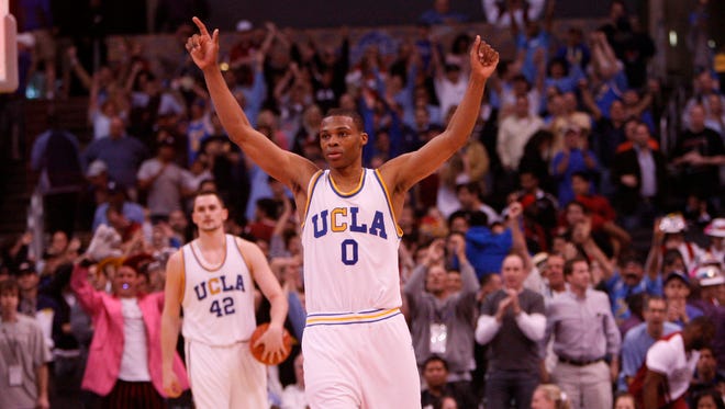 2008: Russell Westbrook raises his arm in victory as time runs out in the Bruins' win over Stanford during the Pac-10 Tournament.