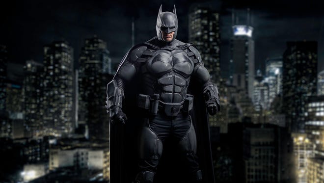 This batsuit is outfitted with smoke bombs, a grapnel gun, bat tracker, UV lamp, NBC (nuclear, bacterial, chemical) bat respirator, and even a bat sign projector for the night sky.