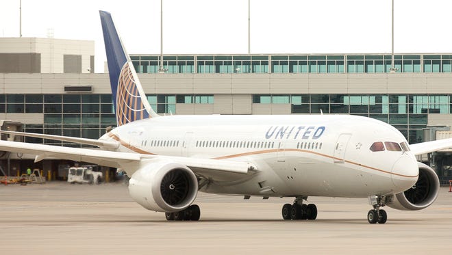 A United Airlines Boeing 787-8 taxies for departure at Denver International Airport in July 2013.