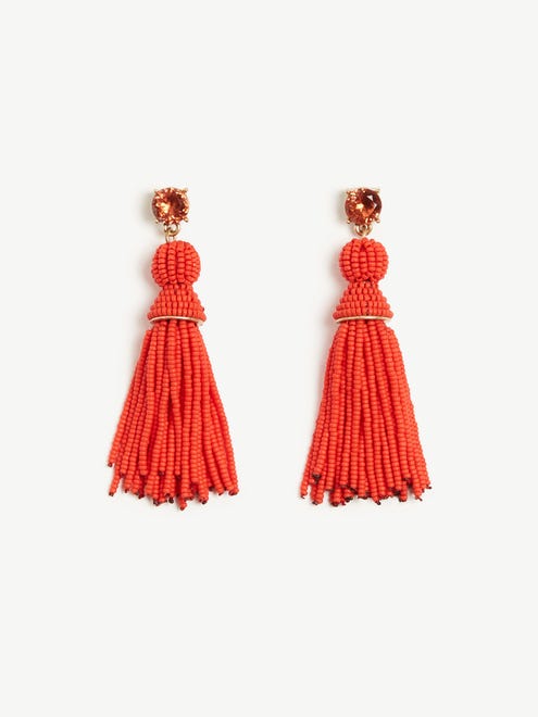 Pair a bright pair of earrings with floral prints, like these Ann Taylor Seed Bead Tassel Earrings, $49.50.
