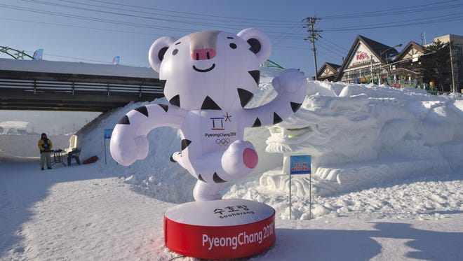 This photo taken Feb. 4 shows the mascot for the 2018 Pyeongchang Winter Olympic Games, a white tiger named "Soohorang", in the town of Hoenggye in Pyeongchang.