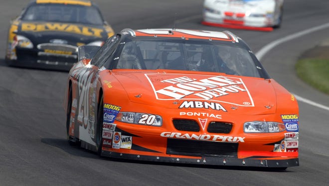 Tony Stewart leads the pack during practice for the 2002 Brickyard 400. Stewart started on the pole and finished 12th.