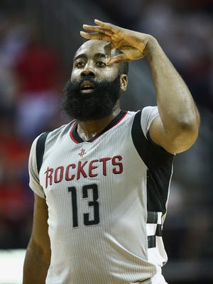 Houston Rockets guard James Harden (13) celebrates after making a three point basket during the third quarter against the San Antonio Spurs in game four of the second round of the 2017 NBA Playoffs at Toyota Center.