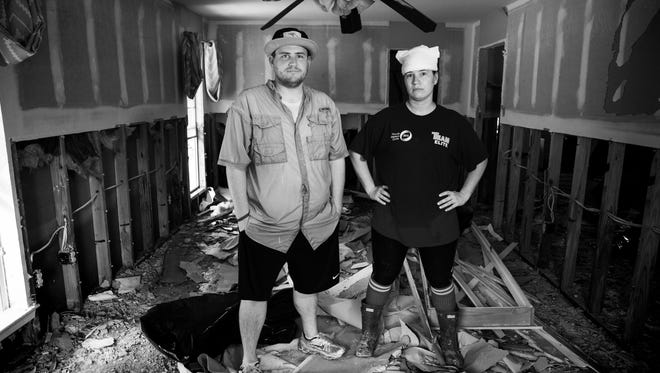 5. Meghan Hansen and her brother, David Camp, stand in a bedroom of what was once a multi-generational home, handed down and lived in for years. As for their grandfather, Meghan remarked, " With his early onset dementia, this has been a last straw. He lost his routine, and thats what kept him stable." They have since placed him in assisted living. Denham Springs, LA.