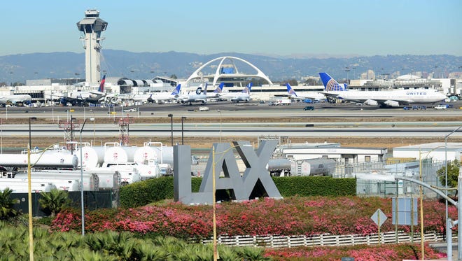 Los Angeles International Airport -- and it's iconic LAX sign -- are seen in October 2013. LAX is United's seventh-busiest hub (by passengers).