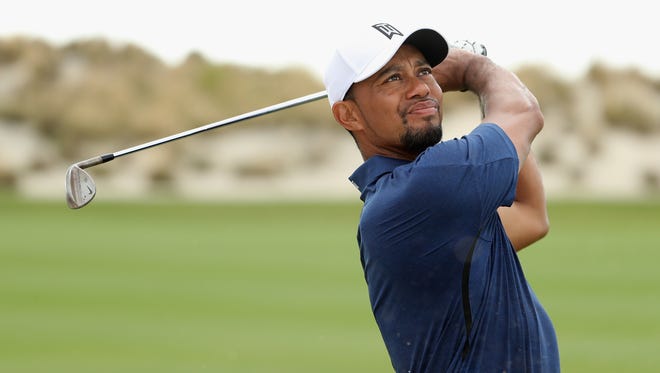 Tiger Woods hits his third shot on the third hole during Round 2 of the Hero World Challenge.