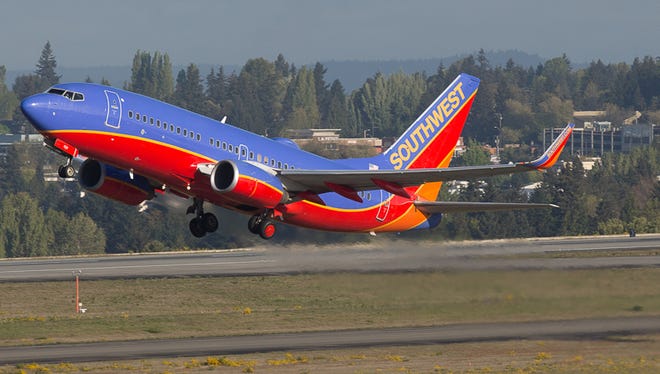 A Southwest Boeing 737 takes off from SeaTac Airport.