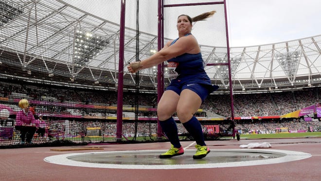 DeAnna Price of the USA competes in hammer qualifying.