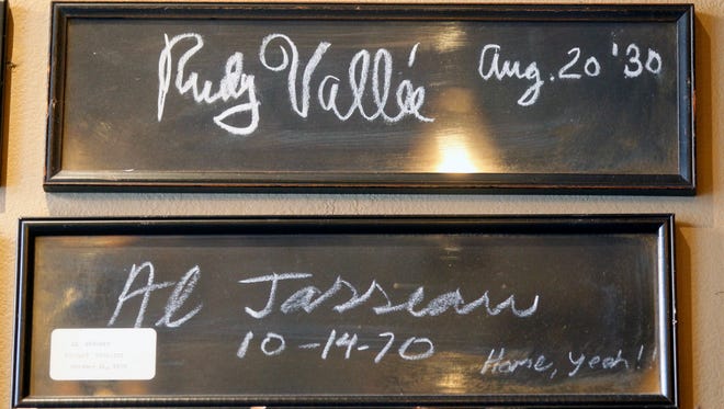 Singers Rudy Vallee and Al Jarreau are part of the Milwaukee Press Club's collection of chalk signatures, which includes presidents, athletes, movie stars, musicians, journalists and more, going back more than 100 years.