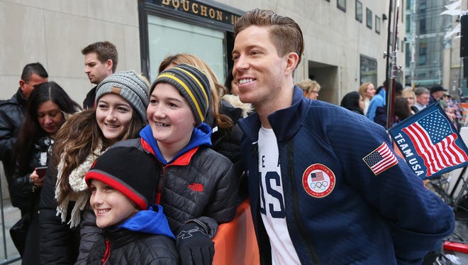 Olympic snowboarder Shaun White poses for a photo with fans during NBC's TODAY on Feb. 8  in New York.