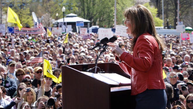 Sarah Palin addresses the crowd during a stop of the Tea Party Express on April 14, 2010, in Boston.