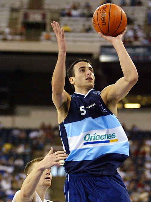 2002: Ginobili shoots over Kirk Penney of New Zealand during the FIBA World Basketball Championships.
