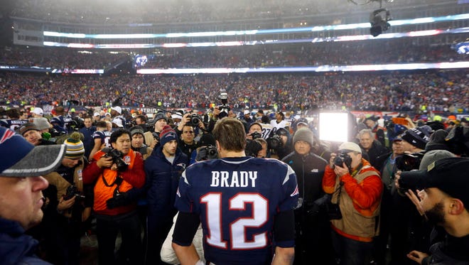 Patriots quarterback Tom Brady (12) is interviewed after defeating the Steelers.