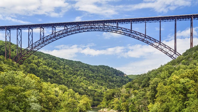 West Virginia - Near Fayetteville, West Virginia, is a 3,030-foot-long steel arch bridge and one of the state’s most popular landmarks. The New River Gorge bridge is engineering at some of its most awe-inspiring.