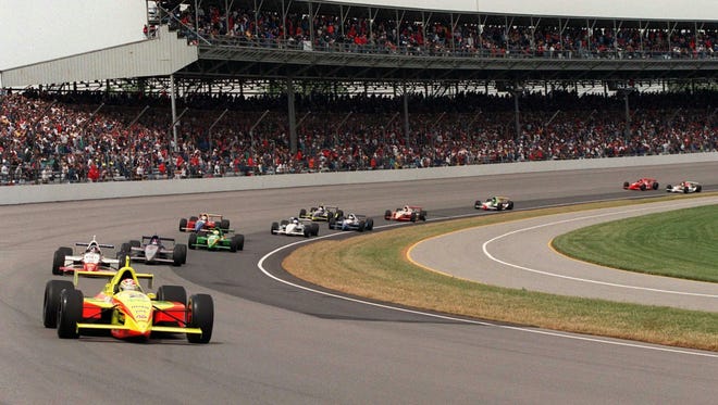 Tony Stewart leads the field on a restart during the Indianapolis 500 in 1997. Stewart started second and finished fifth.