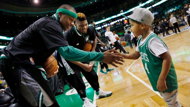 Jan. 2, 2016: Boston Celtics' Isaiah Thomas, left, with his son Jaiden before an NBA basketball game against the Brooklyn Nets in Boston.