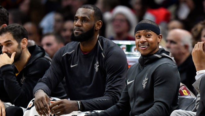Dec. 21, 2017: Cleveland Cavaliers guard Isaiah Thomas (right) sits on the bench beside forward LeBron James (23) in the third quarter against the Chicago Bulls at Quicken Loans Arena. Mandatory Credit: David Richard-USA TODAY Sports
