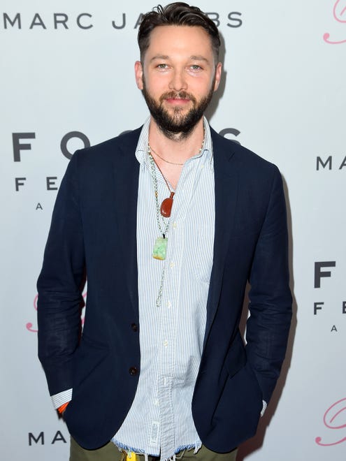 Chris Benz attended in a casual button-up and blazer that he topped off with a few necklaces.