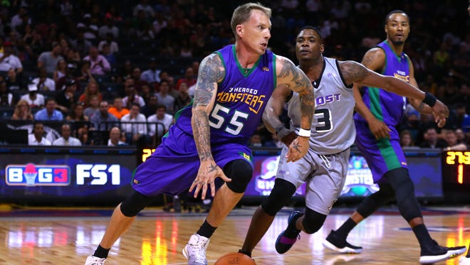 Jason Williams #55 of the 3 Headed Monsters controls the ball against Marcus Banks #3 of the Ghost Ballers during week one of the BIG3 three on three basketball league at Barclays Center on June 25, 2017 in New York City.