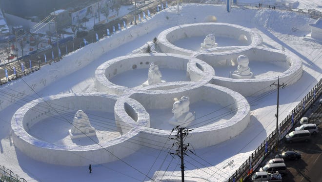 This photo taken Feb. 4 shows the snow sculpture shaped of the Olympic rings at the town of Hoenggye, near the venue for the opening and closing ceremonies for the upcoming Pyeongchang 2018 Winter Olympic Games, in Pyeongchang.