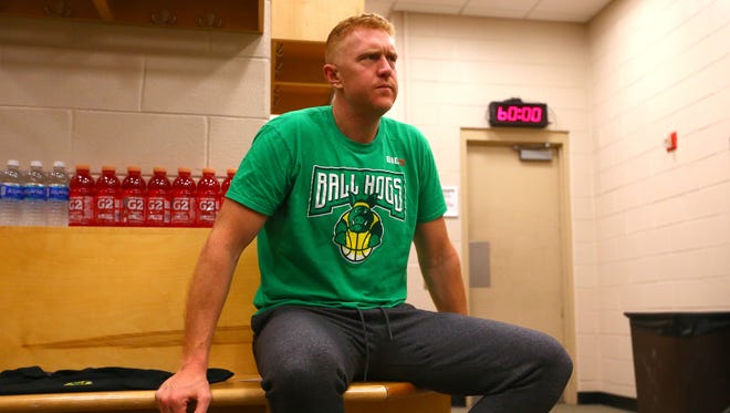 Brian Scalabrine of the Ball Hogs prepares in the locker room.