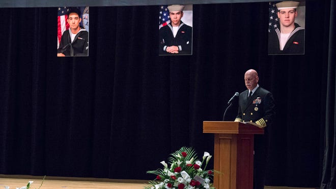 In this photo released by U.S. Navy, Adm. Scott Swift, commander of U.S. Pacific Fleet, delivers remarks during a memorial ceremony at Fleet Activities (FLEACT) Yokosuka, south of Tokyo, Tuesday, June 27, 2017,  for seven sailors assigned to USS Fitzgerald who were killed in the June 17 collision at sea.