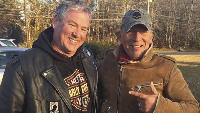 Dan Barkalow, left, and Bruce Springsteen poses for a photo in Wall Township. Barkalow and a group from the Freehold American Legion was riding after a Veterans Day event Friday when they pulled over to help a stranded motorcyclist who turned out to be The Boss.