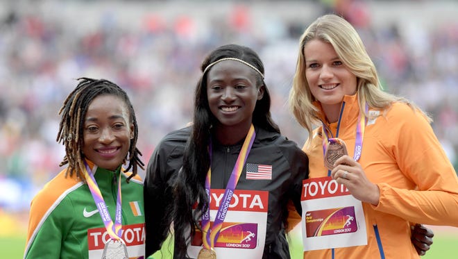 The medalists in the 100 (decided on Day 3), left to right, Marie-Josee Ta Lou of Ivory Coast (silver), Tori Bowie of the USA (gold) and Dafne Schippers of Netherlands (bronze).