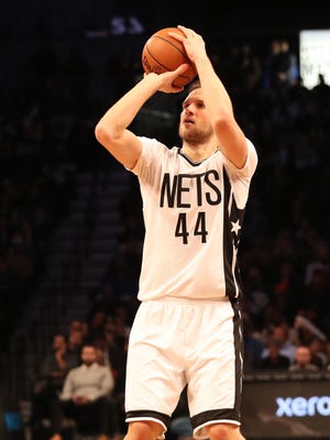 Brooklyn Nets guard Bojan Bogdanovic (44) shoots during the fourth quarter against the Cleveland Cavaliers at Barclays Center.
