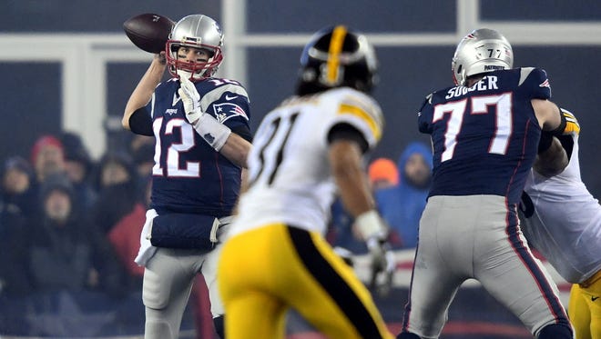 Patriots quarterback Tom Brady (12) throws a pass during the first quarter against the Steelers.