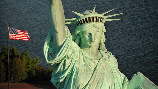 An aerial view of the Statue of Liberty in New York. The national monument would be closed to the public if the federal government shuts down.