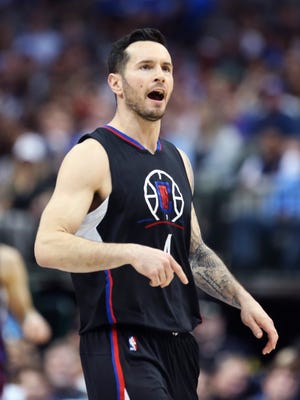 LA Clippers guard JJ Redick (4) reacts after scoring during the first half against the Dallas Mavericks at American Airlines Center.
