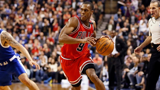 Chicago Bulls guard Rajon Rondo (9) dribbles the ball against the Toronto Raptors at the Air Canada Centre. T