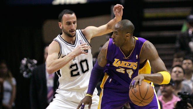 2011: Kobe Bryant is defended by Ginobili during the first half at the AT&T Center.