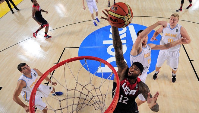 2014: DeMarcus Cousins of the US dunks the ball during the Group C Basketball World Cup match.