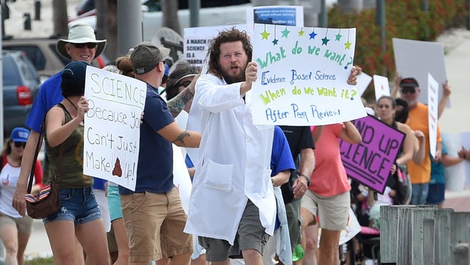 "We're out here to support publicly funded science and evidence-based policy," said Harbor Branch lab assistant Richard Mulroy of Jensen Beach before leading a march of more than two hundred people during the Treasure Coast March for Science along Seaway Drive in Fort Pierce, Fla.