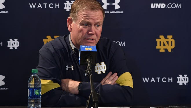 Nov 26, 2016; Los Angeles, CA, USA; Notre Dame Fighting Irish head coach Brian Kelly speaks at the post game press conference following the game against the USC Trojans at the Los Angeles Memorial Coliseum. USC won 45-27. Mandatory Credit: Matt Cashore-USA TODAY Sports