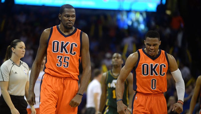 2015: Kevin Durant and Russell Westbrook react after a play against the Utah Jazz.