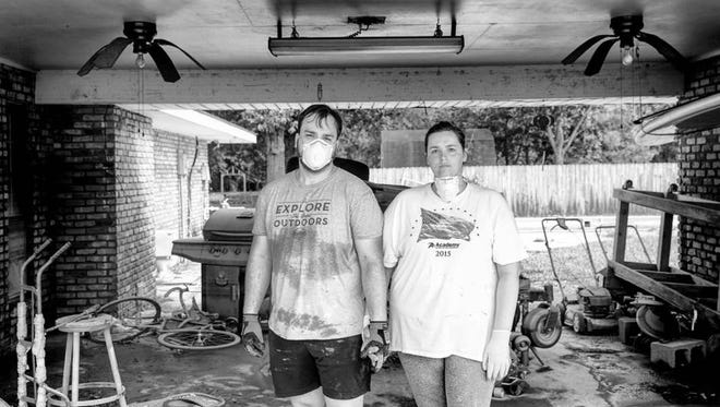 Katie & Nick begin the demo of their home off of Juban Road. They recently remodeled their home, and watched as 6 feet of water destroyed everything. Denham Springs, LA.
