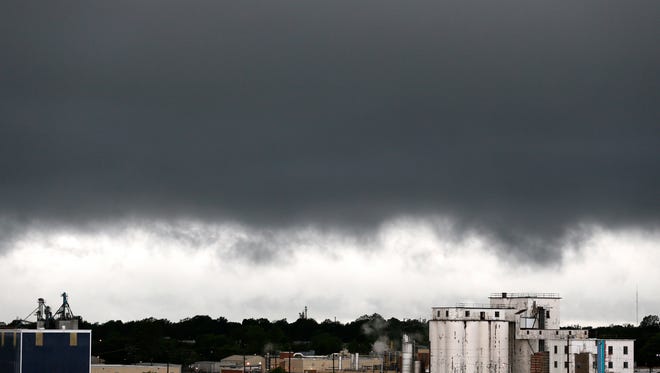 Rain clouds appear over downtown Springfield, Mo., on April 29, 2017.