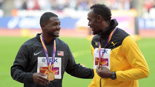 Gold medalist Justin Gatlin of the USA and bronze medalist Usain Bolt of Jamiaca on the medal stand the day after the 100 final.