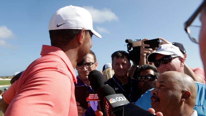 Tiger Woods is interviewed after playing in the Pro-Am at the Hero World Challenge.
