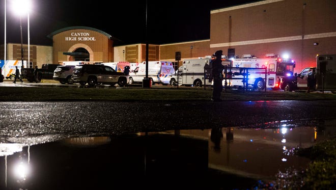 Ambulances and emergency vehicles line up at Canton High School after a tornado ripped through the city of Canton, in Texas, on April 29, 2017. Authorities say fatalities have been reported and dozens of people were taken to hospitals after a tornado hit the small East Texas city of Canton.