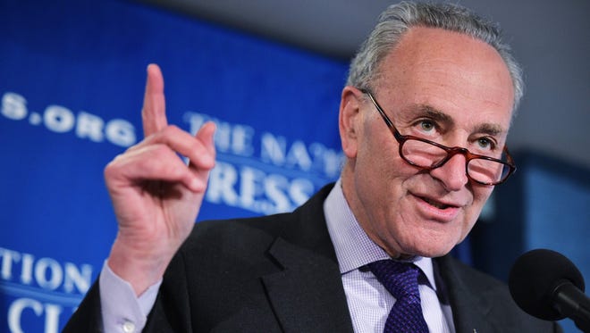 Senate Minority Leader Charles Schumer speaks during a press conference with at the National Press Club on Feb. 27, 2017, a day ahead of US President Donald Trump's scheduled address to a joint session of Congress.