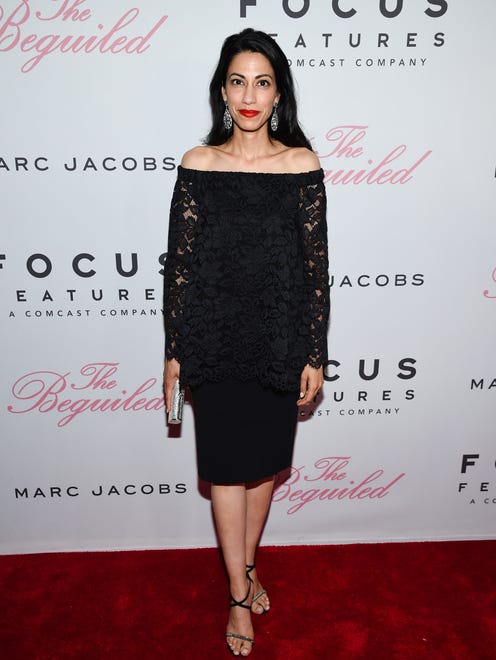 Political advisor Huma Abedin  brought some elegant glam in an off-the-shoulder, lacey ensemble paired with large earrings, strappy heels and a red lip.