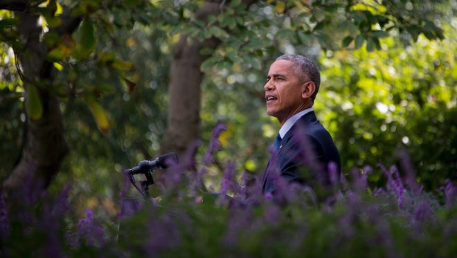 President Obama speaks about the Paris Agreement from the Rose Garden of the White House Wednesday.