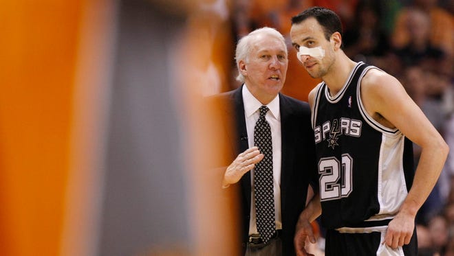 2010: Gregg Popovich talks to Ginobili during Game 2 of the Western Conference semifinals.